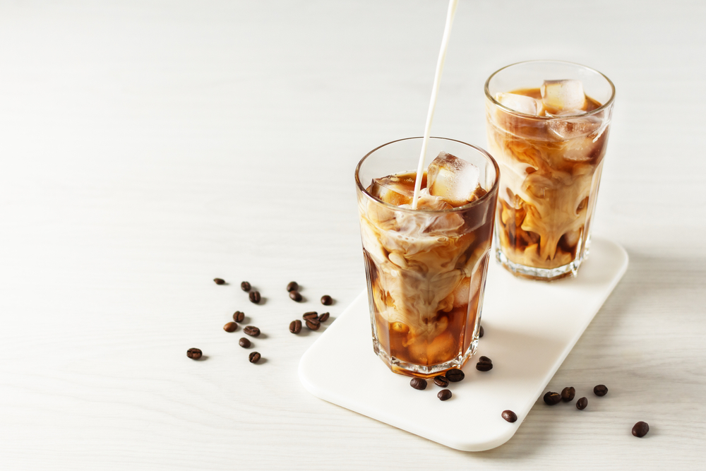 Two iced lattes by mahalia coffee