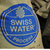 Swiss Water Process logo on a coffee beans bag from Bennetts Coffee Brokers