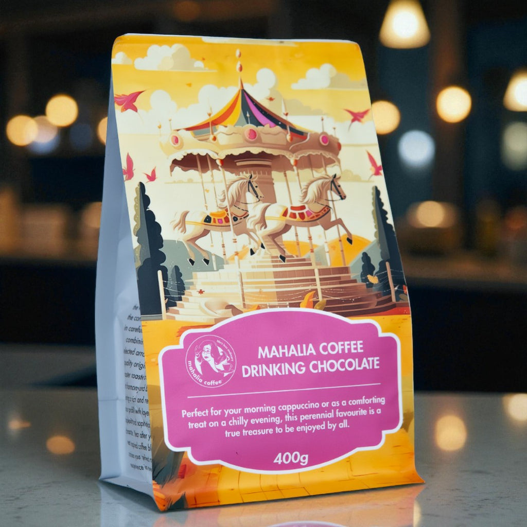 Mahalia Coffee Drinking Chocolate package with a carousel design on a kitchen counter 400g bag